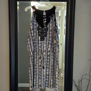 Mini dress with embroidery neckline.